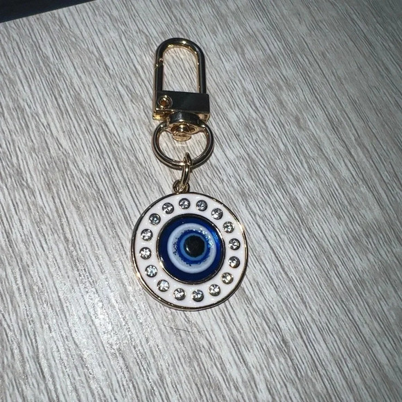 NWOT Evil eye cosmetic pouch with evil eye keychain and blue ponytail. - Picture 3 of 5